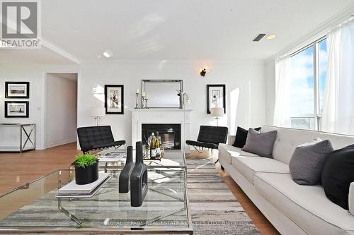 Ph 3 - 850 Steeles Avenue W, Vaughan, ON - Indoor Photo Showing Living Room With Fireplace