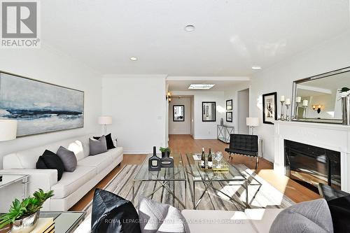 Ph 3 - 850 Steeles Avenue W, Vaughan, ON - Indoor Photo Showing Living Room With Fireplace