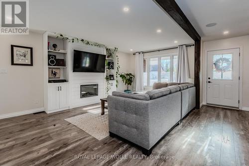 769 John Street W, North Perth, ON - Indoor Photo Showing Living Room With Fireplace