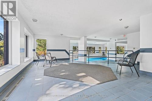 409 - 675 Davis Drive, Kingston (East Gardiners Rd), ON -  Photo Showing Other Room With In Ground Pool