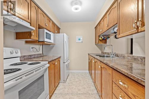 409 - 675 Davis Drive, Kingston (East Gardiners Rd), ON - Indoor Photo Showing Kitchen With Double Sink