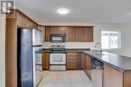 1254 Orchard Avenue, Fort Erie (334 - Crescent Park), ON - Indoor Photo Showing Kitchen With Double Sink