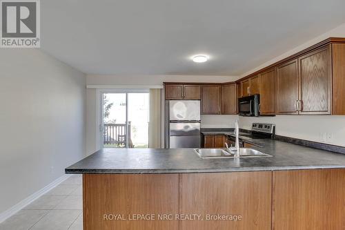 1254 Orchard Avenue, Fort Erie (334 - Crescent Park), ON - Indoor Photo Showing Kitchen With Double Sink