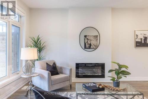 10 - 205 St.Davids Road, Thorold (558 - Confederation Heights), ON - Indoor Photo Showing Living Room With Fireplace