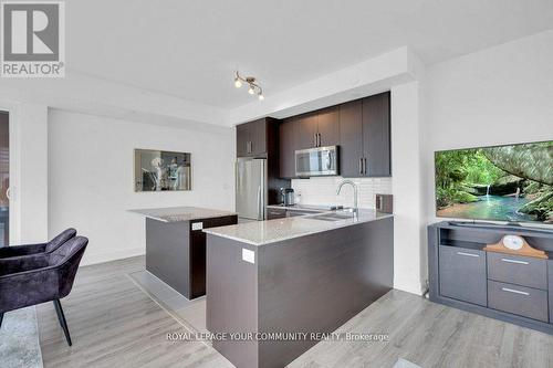 711B - 9600 Yonge Street, Richmond Hill, ON - Indoor Photo Showing Kitchen With Double Sink