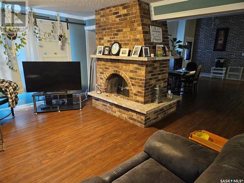 3762 Haliburton Avenue, Furdale, SK - Indoor Photo Showing Living Room With Fireplace