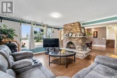 3762 Haliburton Avenue, Furdale, SK - Indoor Photo Showing Living Room With Fireplace