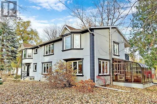 Back of house featuring a sunroom - 2785 Ireton Street Unit# 2, Innisfil, ON - Outdoor