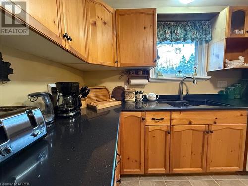 993 Chiswick Line, Powassan, ON - Indoor Photo Showing Kitchen With Double Sink