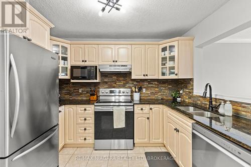 7 - 10 Stonecairn Drive, Cambridge, ON - Indoor Photo Showing Kitchen With Stainless Steel Kitchen With Double Sink