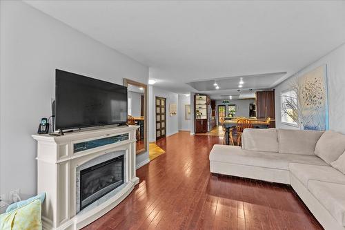 3430 Silverberry Road, Kelowna, BC - Indoor Photo Showing Living Room With Fireplace