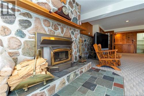 72 Park Drive, Rothesay, NB - Indoor Photo Showing Living Room With Fireplace