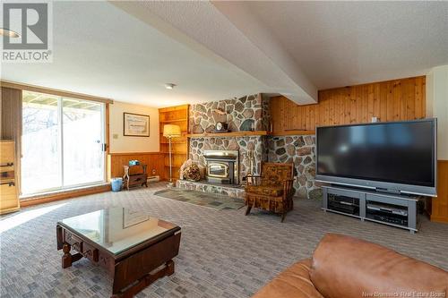 72 Park Drive, Rothesay, NB - Indoor Photo Showing Living Room With Fireplace