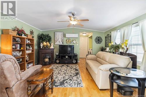 18 Aspenwood Street, Moncton, NB - Indoor Photo Showing Living Room With Fireplace