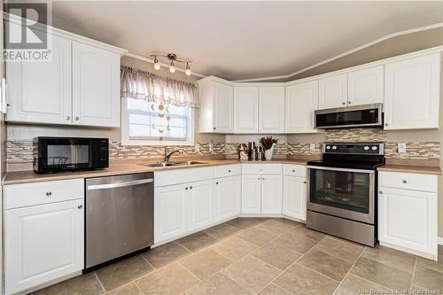 18 Aspenwood Street, Moncton, NB - Indoor Photo Showing Kitchen With Double Sink