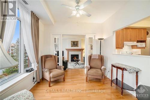 407 - 136 Darlington, Ottawa, ON - Indoor Photo Showing Living Room With Fireplace