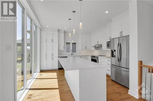 This home is to be built. Photos are of a similar model to showcase builder finishes. - 513 Barrage Street, Casselman, ON - Indoor Photo Showing Kitchen With Upgraded Kitchen