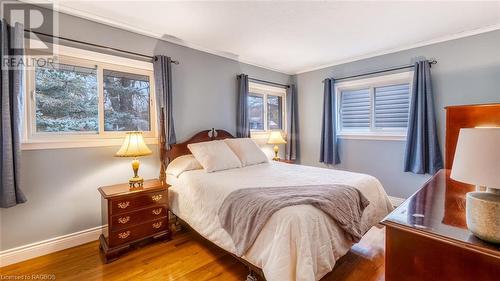 Bedroom featuring wood-type flooring and crown molding - 490 7Th Street W, Owen Sound, ON - Indoor Photo Showing Bedroom