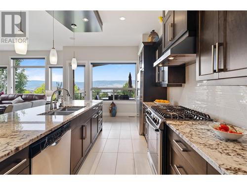 569 Harrogate Lane, Kelowna, BC - Indoor Photo Showing Kitchen With Stainless Steel Kitchen With Double Sink With Upgraded Kitchen