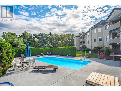 735 Cook Road Unit# 104D, Kelowna, BC - Outdoor With In Ground Pool