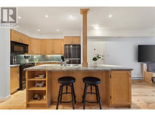 735 Cook Road Unit# 104D, Kelowna, BC - Indoor Photo Showing Kitchen With Double Sink