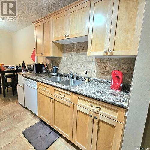 524 500 Olive Diefenbaker Drive, Prince Albert, SK - Indoor Photo Showing Kitchen With Double Sink