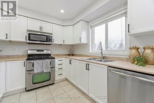 59 Decourcy-Ireland Circle, Ajax, ON - Indoor Photo Showing Kitchen With Double Sink