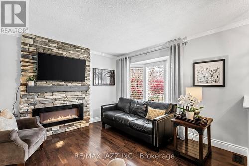 23 Pilkington Crescent, Whitby (Pringle Creek), ON - Indoor Photo Showing Living Room With Fireplace