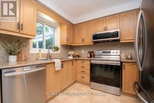 180 Sandringham Drive, Clarington (Courtice), ON - Indoor Photo Showing Kitchen With Double Sink