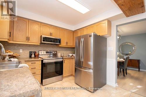 180 Sandringham Drive, Clarington (Courtice), ON - Indoor Photo Showing Kitchen With Double Sink