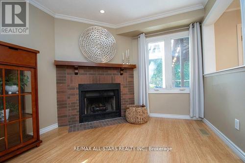 180 Sandringham Drive, Clarington (Courtice), ON - Indoor Photo Showing Living Room With Fireplace