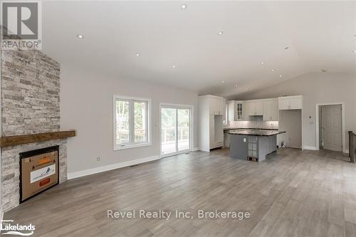 Lot 19 Voyageur Drive, Tiny, ON - Indoor With Fireplace