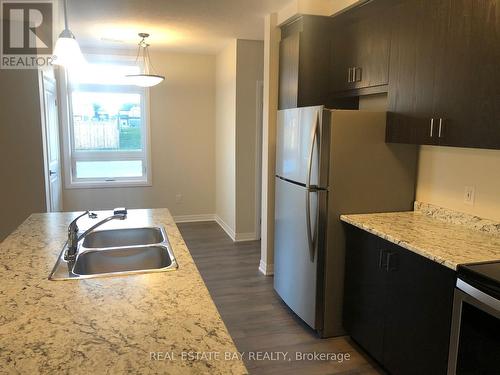 1A - 155 Thomas Slee Drive, Kitchener, ON - Indoor Photo Showing Kitchen With Double Sink