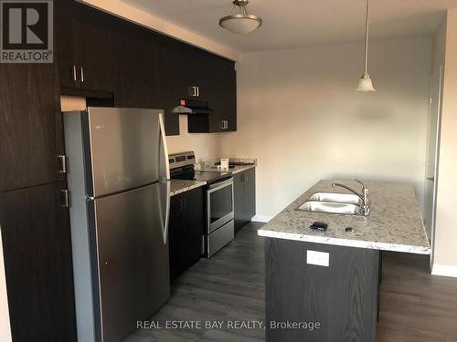 1A - 155 Thomas Slee Drive, Kitchener, ON - Indoor Photo Showing Kitchen With Stainless Steel Kitchen With Double Sink