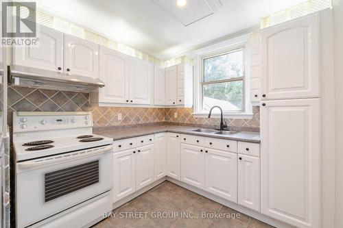 81 East 11Th Street, Hamilton, ON - Indoor Photo Showing Kitchen With Double Sink