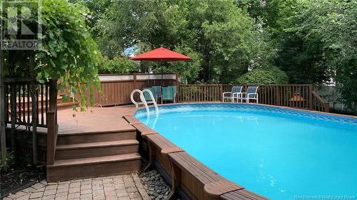 76 Greenhaven Drive, Moncton, NB - Outdoor With Above Ground Pool With Backyard