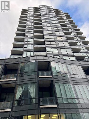 View of building exterior - 104 Garment Street Unit# 1608, Kitchener, ON - Outdoor With Balcony