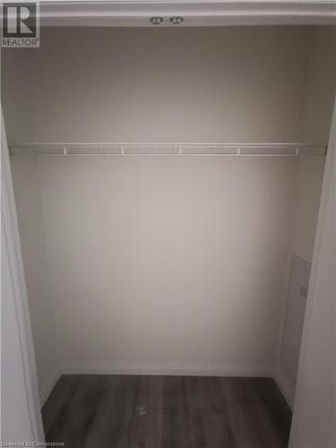 View of closet - 104 Garment Street Unit# 1608, Kitchener, ON - Indoor With Storage