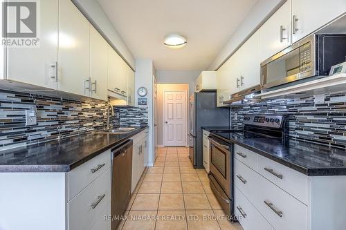 704 - 162 Martindale Road, St. Catharines (453 - Grapeview), ON - Indoor Photo Showing Kitchen With Double Sink With Upgraded Kitchen