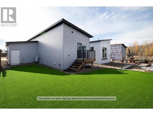 Backyard - Grass is Virtually added to show finished result - 8900 Jim Bailey Road Unit# 171, Kelowna, BC 