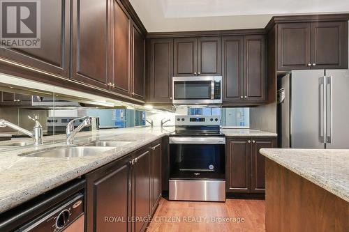 2304 - 21 Grand Magazine Street, Toronto, ON - Indoor Photo Showing Kitchen With Double Sink