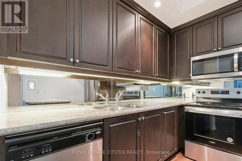 2304 - 21 Grand Magazine Street, Toronto, ON - Indoor Photo Showing Kitchen With Double Sink