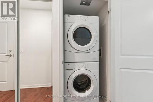 2304 - 21 Grand Magazine Street, Toronto, ON - Indoor Photo Showing Laundry Room