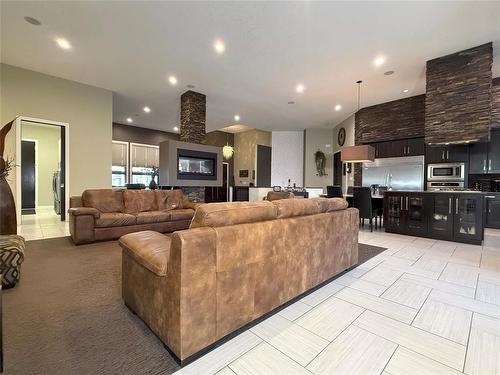 7 Wren Crescent, Brandon, MB - Indoor Photo Showing Living Room With Fireplace