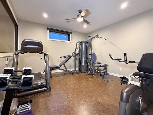 7 Wren Crescent, Brandon, MB - Indoor Photo Showing Gym Room