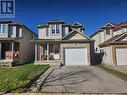 View of front of property with a garage and covered porch - 973 Atlantic Boulevard, Waterloo, ON  - Outdoor With Deck Patio Veranda With Facade 