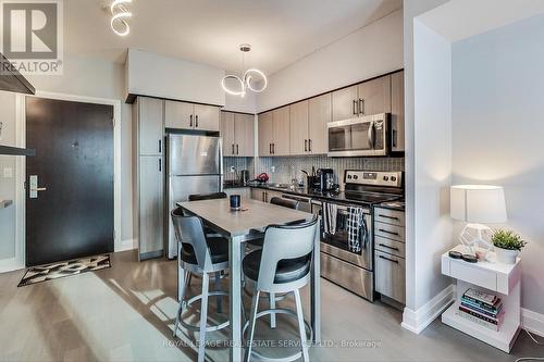 1313 - 55 Speers Road, Oakville, ON - Indoor Photo Showing Kitchen With Stainless Steel Kitchen