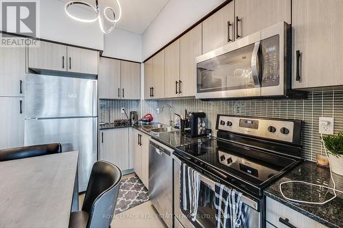 1313 - 55 Speers Road, Oakville, ON - Indoor Photo Showing Kitchen With Stainless Steel Kitchen With Double Sink With Upgraded Kitchen