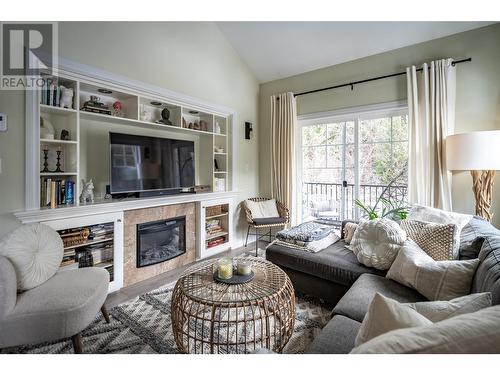 2001 Perrier Road Unit# 204, Nelson, BC - Indoor Photo Showing Living Room With Fireplace