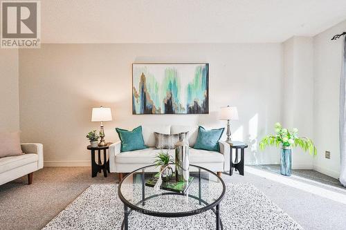 99 - 1221 Dundix Road, Mississauga, ON - Indoor Photo Showing Living Room